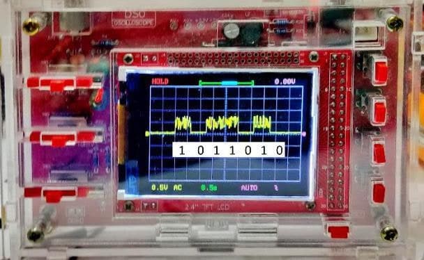 Oscilloscope trace of the encoded message 1011010, each 1 a burst of carrier
